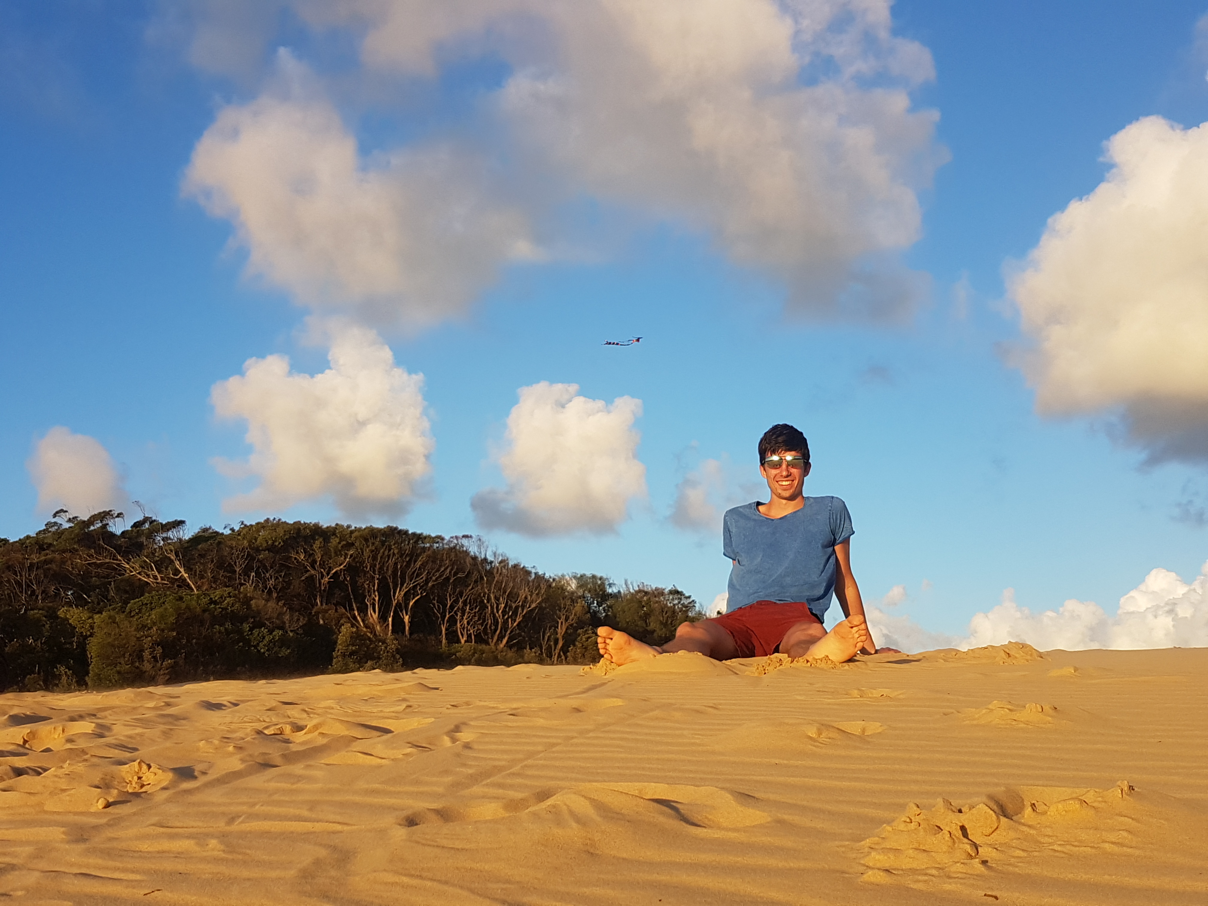 Sitting on a dune in rainbow beach